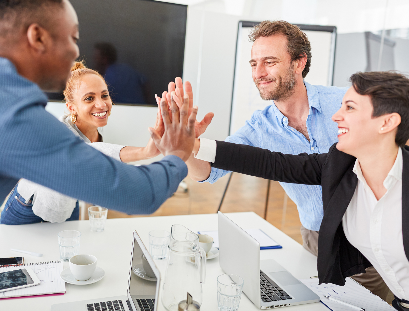 excited group having a high five
